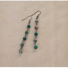 Auskari ar dabīgiem akmeņiem